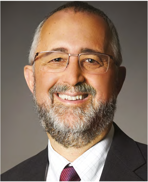 Retrato profesional del Dr. Paul Bernstein, especialista en retina y pionero en investigación sobre pigmentos maculares y nutrición ocular en la Universidad de Utah.